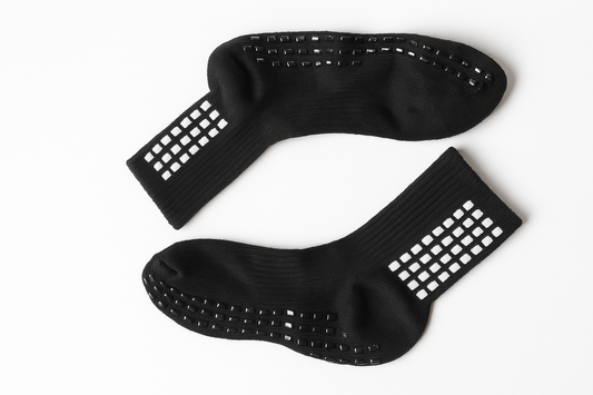 "Grip Socks That Stay – No Matter the Game, No Matter the Ground."